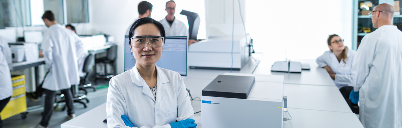 A laboratory technician in a laboratory environment