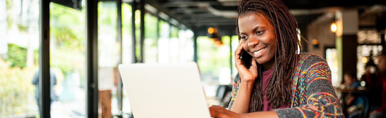 A woman is talking on her cell phone