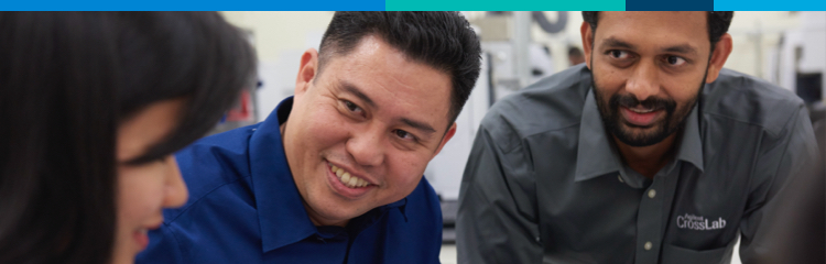 Team members in discussion smiling